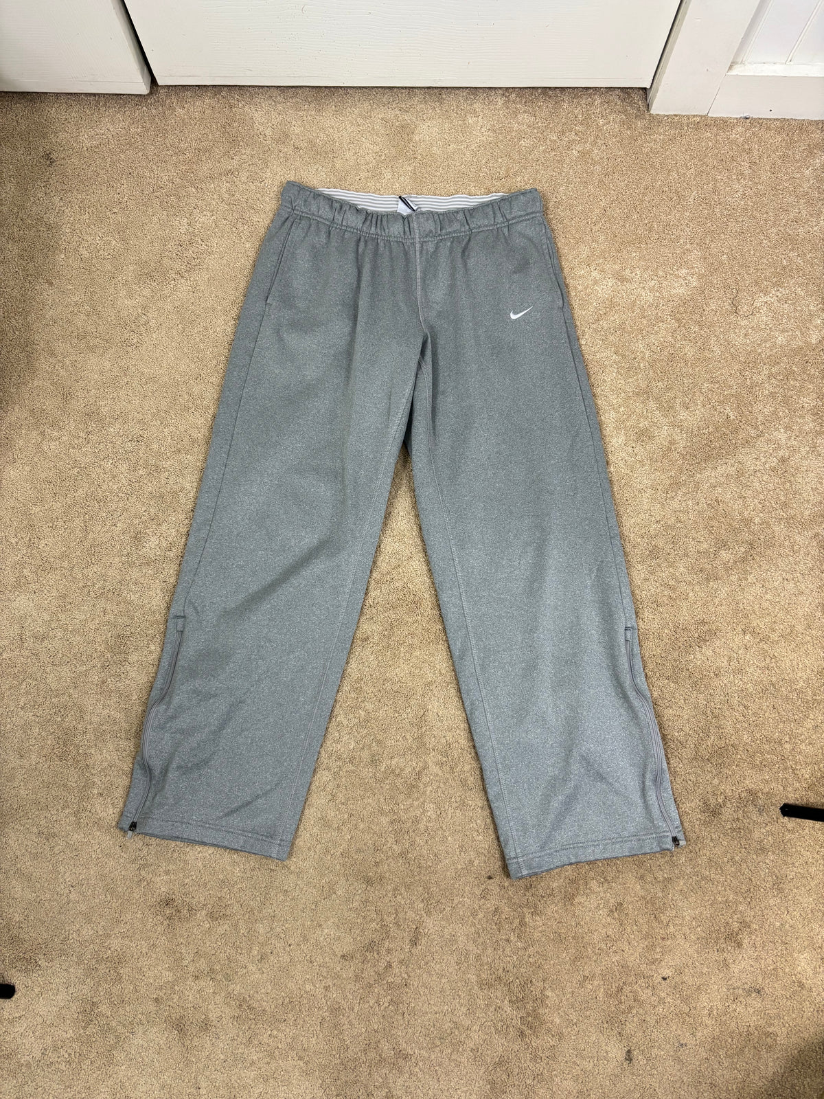 Nike lounge pants with elastic drawstring waist